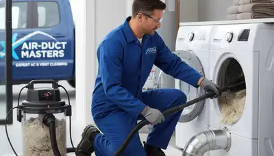 Technician cleaning dryer vent for home safety in Columbus, OH | Five Star Cooling